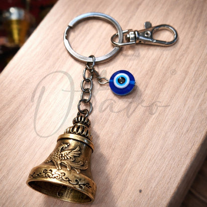 OTTAVO Premium Guardian Bell Keychain for Bike & Car | Tibetan Texture Bell Keychain with Evil Eye & Silver Hook | Good Luck Charm with Laser-Engraved Wooden Gift Box (Antique Brass)